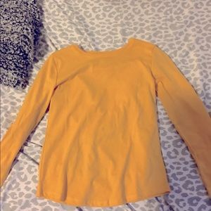 I am selling this cute plain yellow long sleeve shirt. Also great for anywhere.